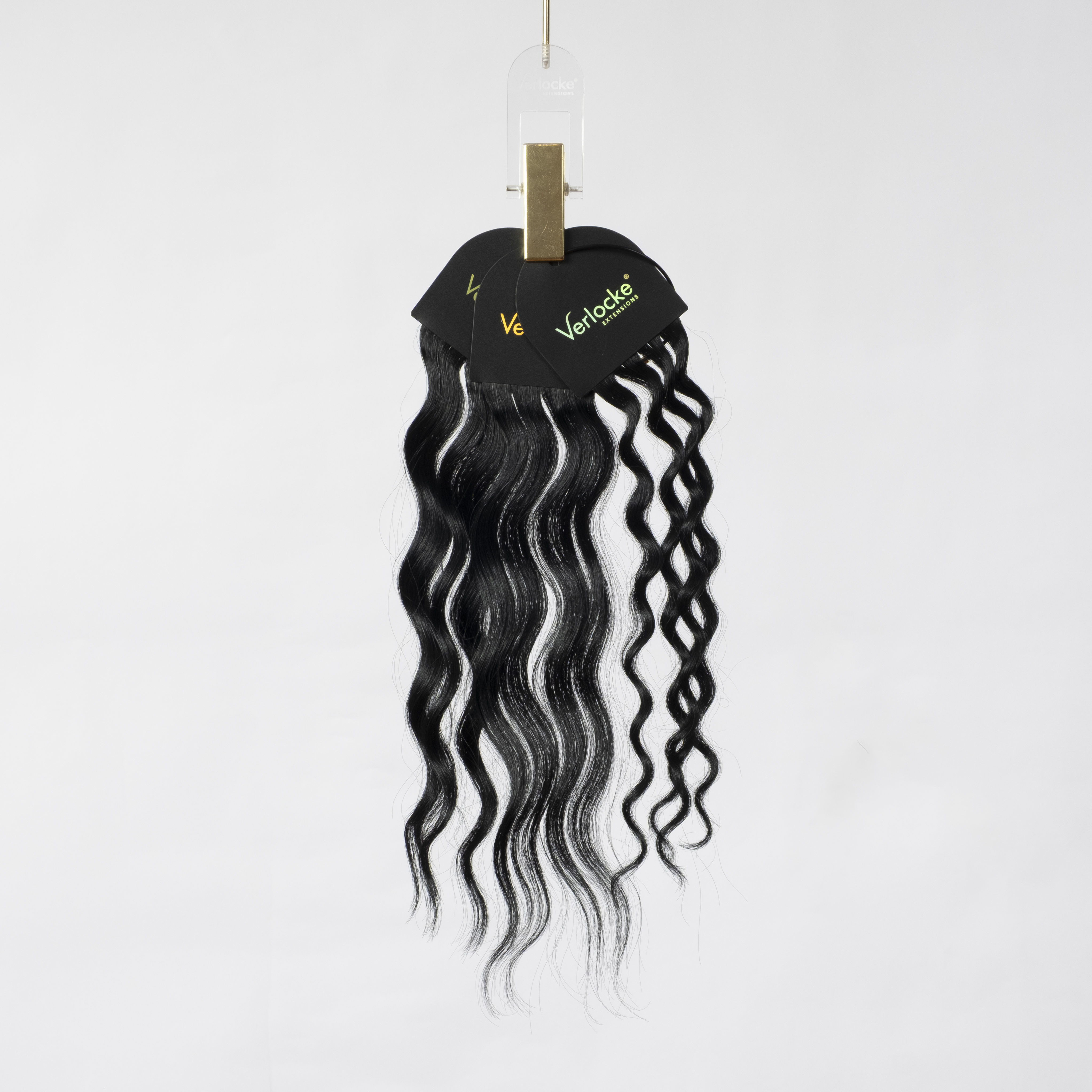 Verlocke Haarmuster mit verschiedenen Wellen und Locken